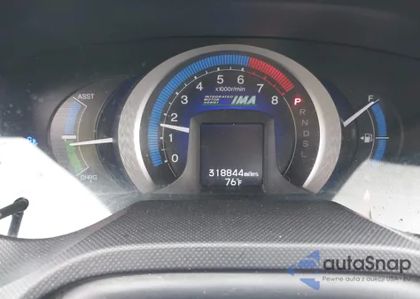 2010 Honda Insight Lx z USA, uszkodzony, nr VIN JHMZE2H50AS022296